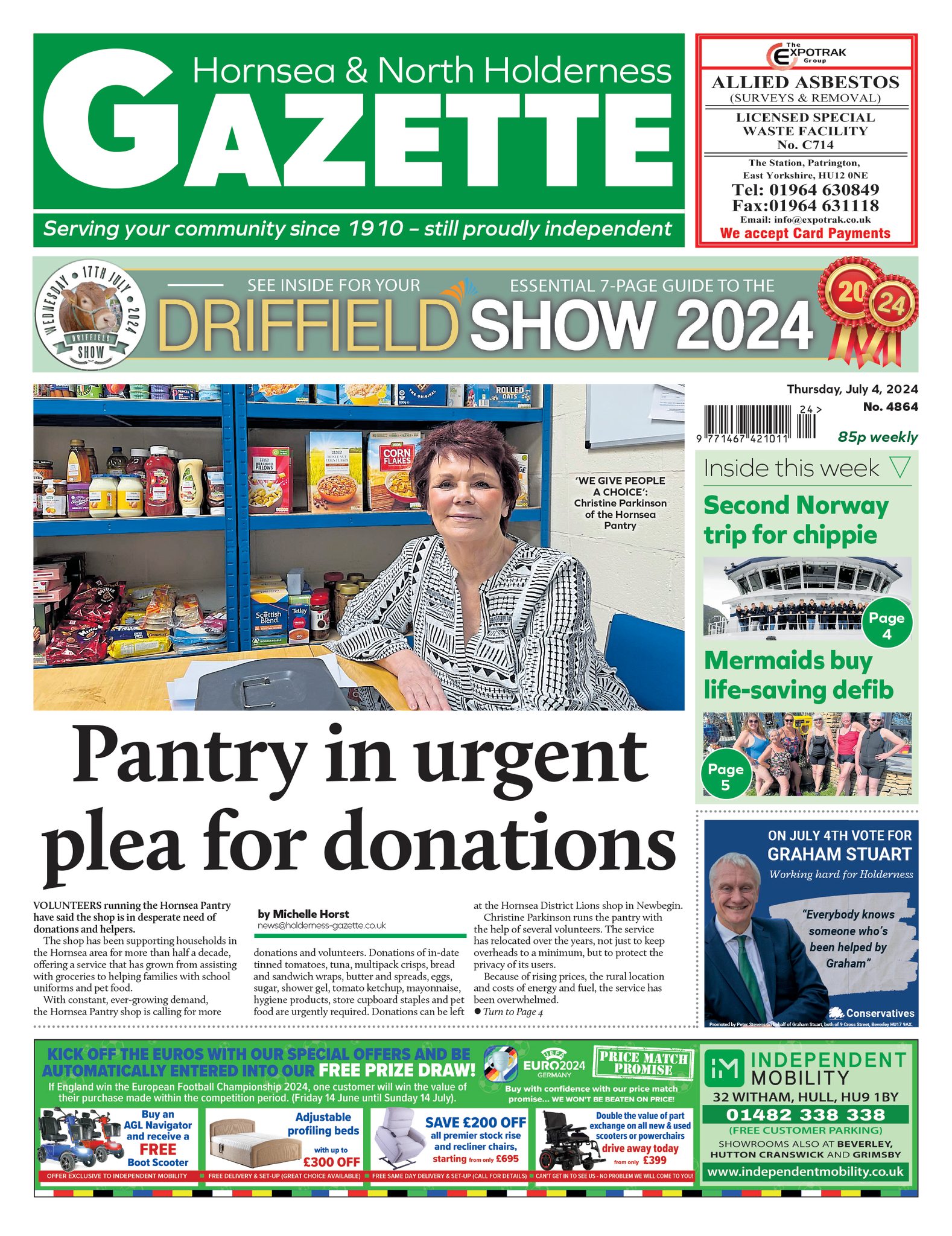 Image is of Hornsea and Holderness Gazette July 4th 2024 edition. The Gazette logo is green with white font. Headline reads Pantry in urgent plea for donations. Photo shows woman at desk with low stock of tinned food behind her.